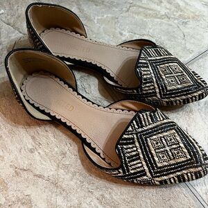 Women's Black and Tan Flats